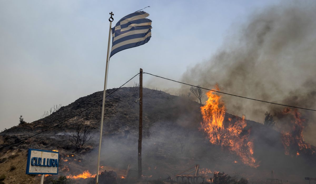 NextImg:Fire still blazing on the Greek island of Rhodes as dozens more erupt across the country