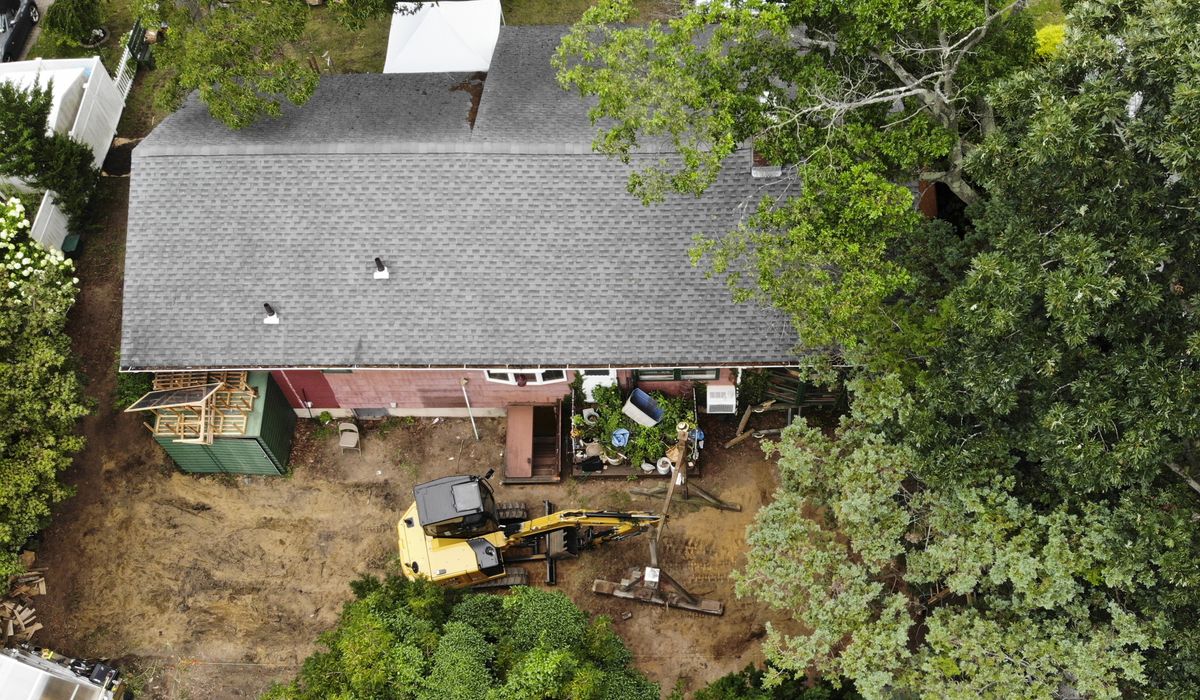 NextImg:Excavator seen digging in backyard of man charged in Gilgo Beach killings