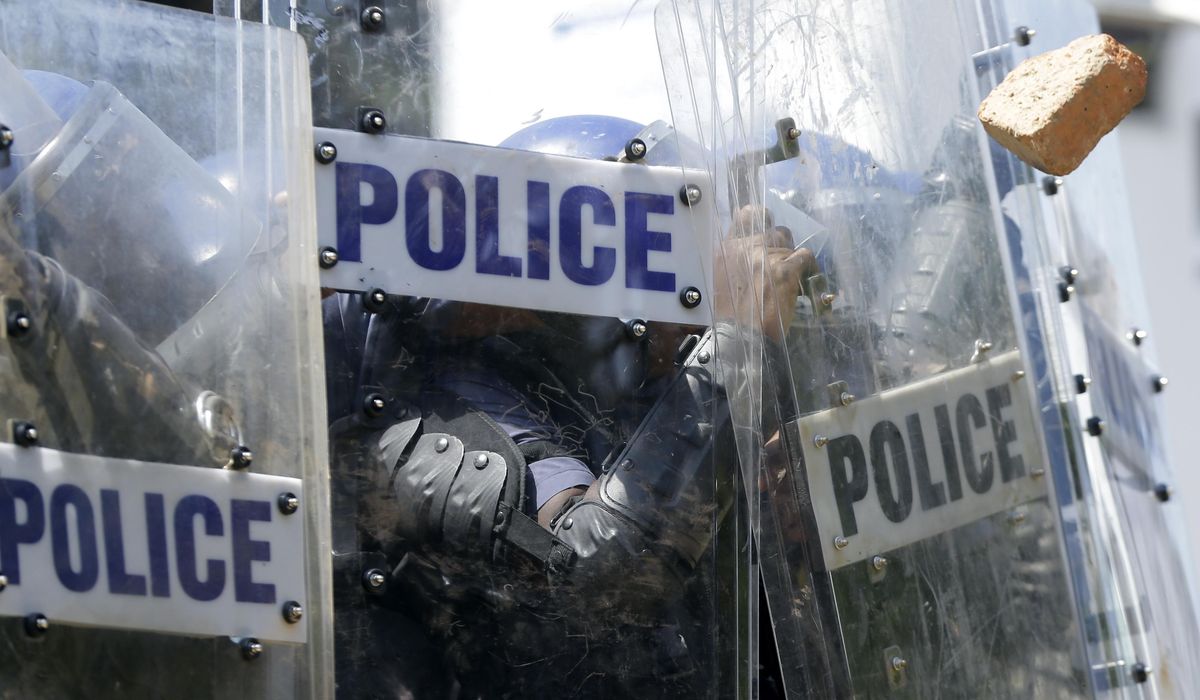 NextImg:South Africa arrests 8 officers assigned to the country’s deputy president over highway brutality