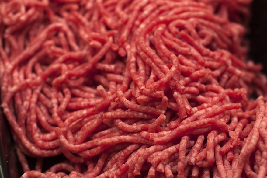 Ground beef is displayed for sale, April 1, 2017, at a market in Washington. Federal health officials said Tuesday, July 25, 2023, that ground beef contaminated with salmonella has sickened at least 16 people, including six hospitalized, in four Northeastern states. (AP Photo/J. Scott Applewhite, File)