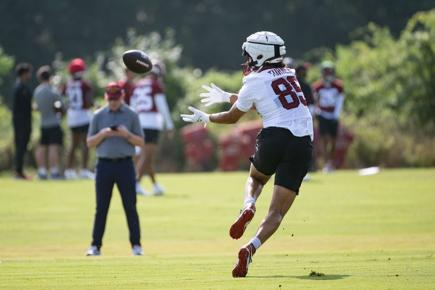 Washington Commanders tight end Cole Turner (85) catches a pass during the first day of training camp at the OrthoVirginia Training Center at Commanders Park in Ashburn, Virginia, July 27, 2023. (Photo by Brian Murphy)
