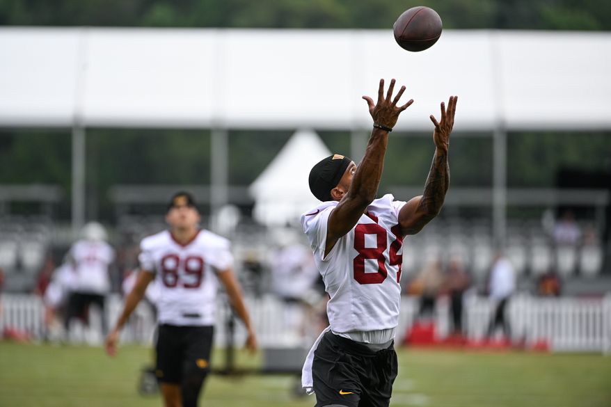 Washington Commanders receiver Zion Bowens (84) catches a pass during the second day of training camp at the OrthoVirginia Training Center at Commanders Park in Ashburn, Virginia, July 27, 2023. (Photo by Brian Murphy)