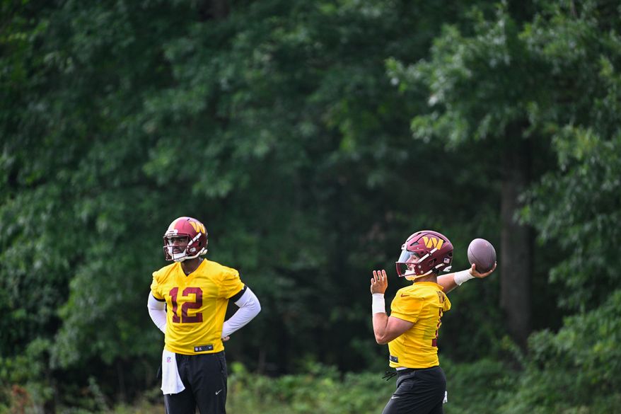 Washington Commanders quarterback Sam Howell (14) throws a pass during the second day of training camp at the OrthoVirginia Training Center at Commanders Park in Ashburn, Virginia, July 27, 2023. (Photo by Brian Murphy)