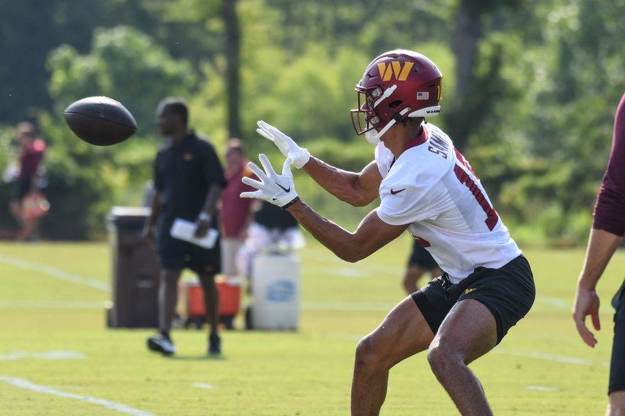 Washington Commanders wide receiver Jalen Sample (18) about to make a catch during the third day of training camp at the OrthoVirginia Training Center at Commanders Park in Ashburn, Virginia, July 29, 2023. (Photo by Billy Sabatini)