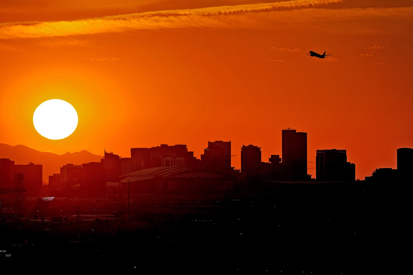 Phoenix suffers 31st 110-degree day and wildfires spread in California