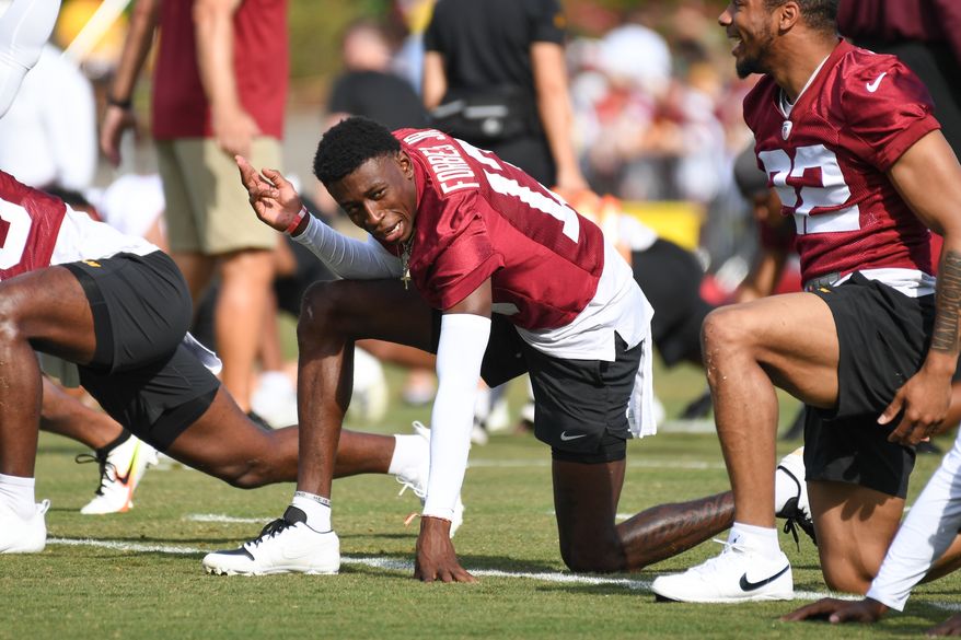 Washington Commanders cornerback Emmanuel Forbes, Jr. (13) taking part of stretching exercises during the fourth day of training camp at the OrthoVirginia Training Center at Commanders Park in Ashburn, Virginia, July 29, 2023. (Photo by Billy Sabatini)