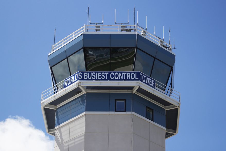 The control tower sits above the Wittman Regional Airport in Oshkosh, Wis. The daughter of a Super Bowl-winning former NFL player and her co-pilot are among the four people who died last weekend in two separate crashes at the annual Airventure convention which takes place annually at the Wittman Regional Airport. (AP Photo/Carrie Antlfinger, File)