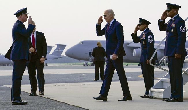 President Joe Biden arrives on Air Force One at Dover Air Force Base in Delaware, on July 28, 2023. The indictment of Donald Trump for attempting to overturn his election defeat is a new front in what Joe Biden has described as the battle for American democracy. It&#x27;s the issue that Biden has described as the most consequential struggle of his presidency. The criminal charges are a reminder of the stakes of next year&#x27;s campaign, when Trump is hoping for a rematch with Biden. (AP Photo/Susan Walsh, File)