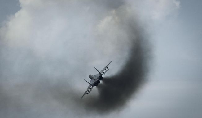 A Mig-29 fighter of the Ukrainian air force is seen on a mission in Ukraine&#x27;s war-hit east Wednesday, Aug. 2, 2023. (AP Photo/Libkos)
