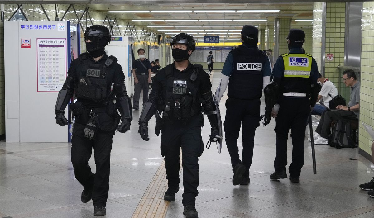 NextImg:South Korea detains suspect in high school teacher’s stabbing a day after separate attack wounded 14