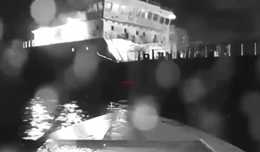 In this image from video made available on Saturday, Aug. 5, 2023, a seaborne drone approaches a Russian tanker on the Black Sea. Ukrainian drones have hit a Russian tanker in the Black Sea near Crimea, according to Russian officials. The strike was the second sea attack involving drones in one day, after Ukraine said its sea drones also struck a major Russian port earlier on Friday. (AP Photo)