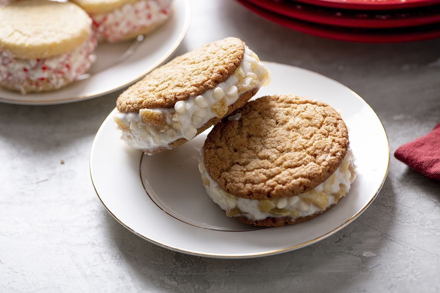 This Dec. 2018 image shows cookie ice cream sandwiches with crushed candies on the outside. (Cheyenne Cohen/Katie Workman via AP)