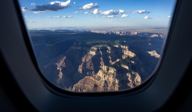 The Grand Canyon is seen while in flight from Air Force One, with President Joe Biden aboard, en route to Grand Canyon National Park Airport, Monday, Aug. 7, 2023, in Grand Canyon Village, Ariz. (AP Photo/Alex Brandon)