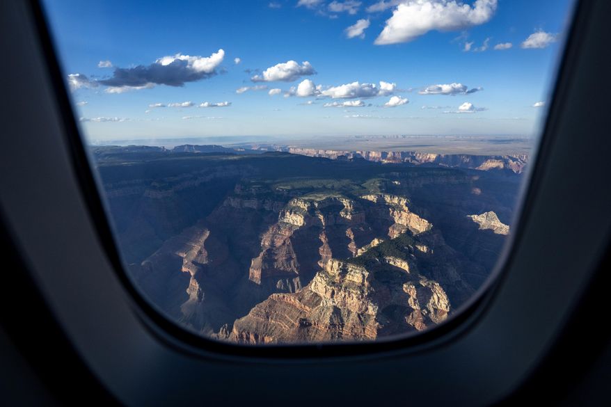 The Grand Canyon is seen while in flight from Air Force One, with President Joe Biden aboard, en route to Grand Canyon National Park Airport, Monday, Aug. 7, 2023, in Grand Canyon Village, Ariz. (AP Photo/Alex Brandon)