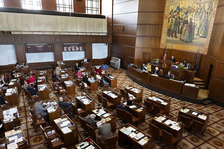 The Oregon Senate is seen in session at the state capitol in Salem, Ore., Thursday, June 15, 2023. Oregon's elections chief says the 10 Republican state senators who had more than 10 unexcused absences during the most recent GOP walkout can't run for reelection in 2024. Secretary of State LaVonne Griffin-Valade made the announcement Tuesday, Aug. 8, 2023, in a bid to clear up confusion over reelection rules following the 2023 walkout. (AP Photo/Andrew Selsky, File)