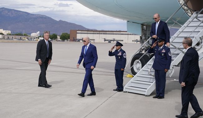 President Joe Bidensteps off Air Force One upon arrival at Kirtland Air Force Base, Tuesday, Aug. 8, 2023, in Albuquerque, N.M. (AP Photo/Alex Brandon)