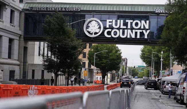 Barricades are seen near the Fulton County courthouse, Monday, Aug. 7, 2023, in Atlanta. (AP Photo/Brynn Anderson) ** FILE **