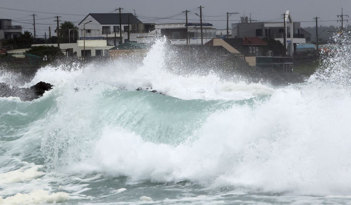 NextImg:Khanun begins blowing into South Korea with strong winds after dumping rain on Japan for a week
