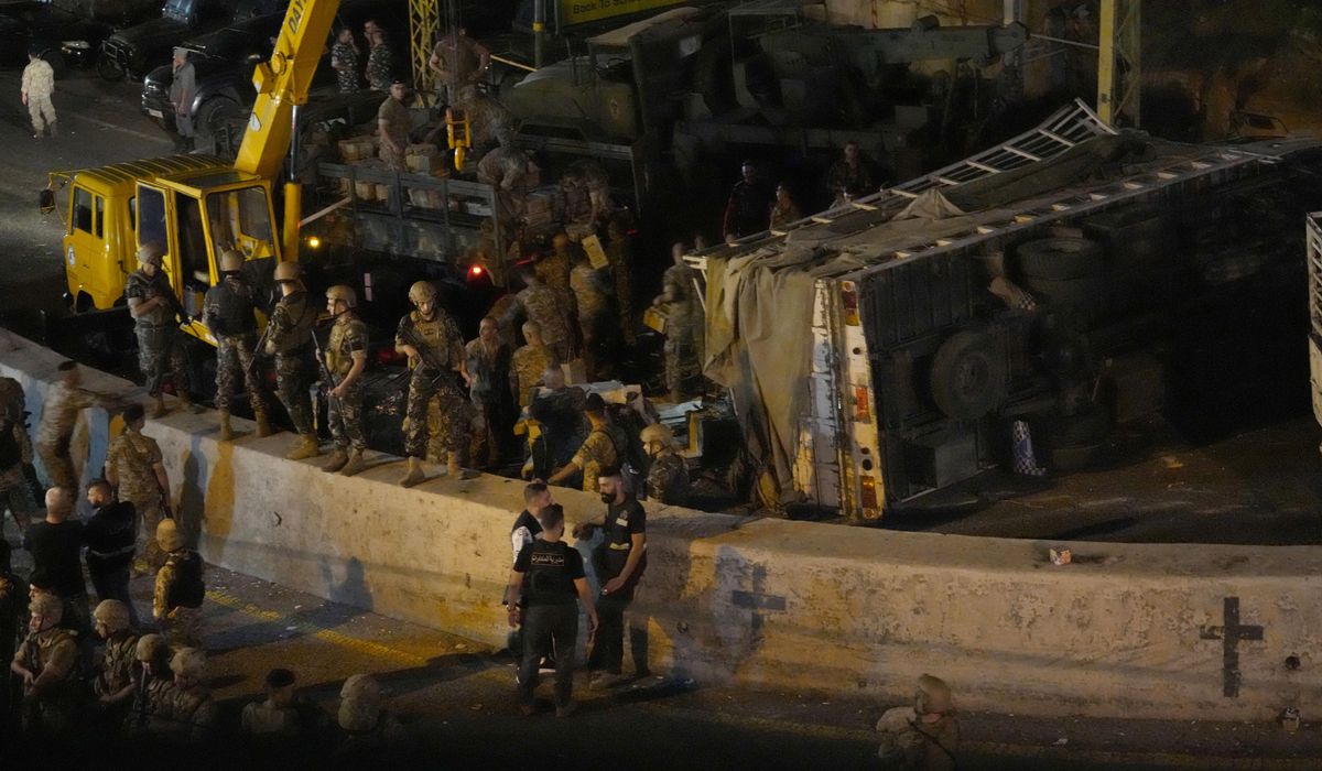 NextImg:Lebanese army takes Hezbollah truck containing munitions after 2 die in clashes