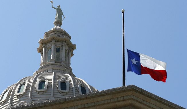 The Texas flag flies at half-staff on the Capitol, Sept. 14, 2006, in Austin, Texas. A Texas judge presiding over Republicans&#x27; widespread challenges to losses in the 2022 elections around Houston said Thursday, Aug. 10, 2023 he will likely not issue a decision for weeks in a trial that offered no evidence that paper ballot shortages last November affected the outcome. (AP Photo/Harry Cabluck, file)