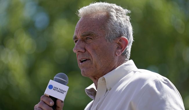 Democratic presidential candidate Robert F. Kennedy Jr., speaks during The Des Moines Register Political Soapbox at the Iowa State Fair, Saturday, Aug. 12, 2023, in Des Moines, Iowa. (AP Photo/Jeff Roberson)