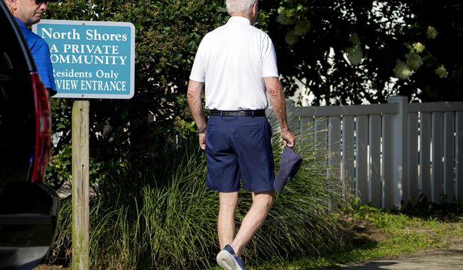 President Joe Biden walks towards the beach near his family home in Rehoboth Beach, Del., Sunday, Aug. 13, 2023. (AP Photo/Manuel Balce Ceneta)