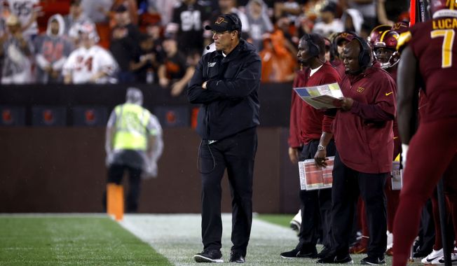 Washington Commanders head coach Ron Rivera stands on the sideline during an NFL pre-season football game against the Cleveland Browns, Friday, Aug. 11, 2023, in Cleveland. (AP Photo/Kirk Irwin)