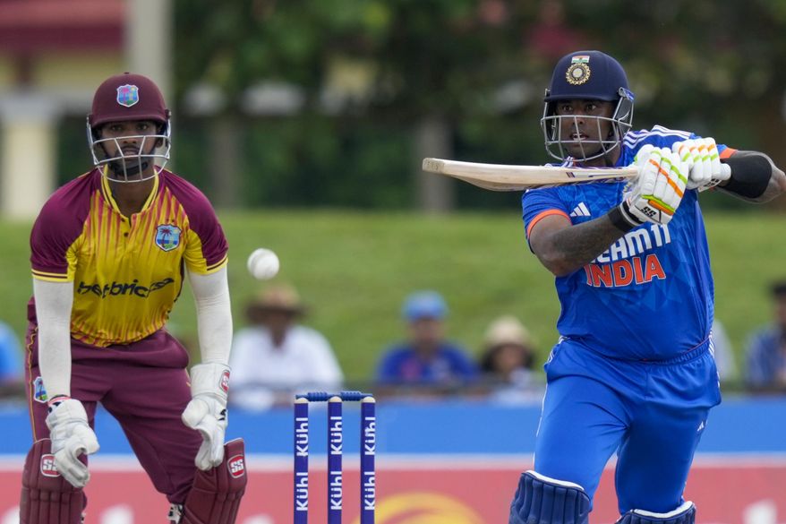 India's Suryakumar Yadav plays a shot against West Indies during the fifth T20 cricket match at Central Broward Regional Park in Lauderhill, Fla, Sunday, Aug. 13, 2023. (AP Photo/Ramon Espinosa)