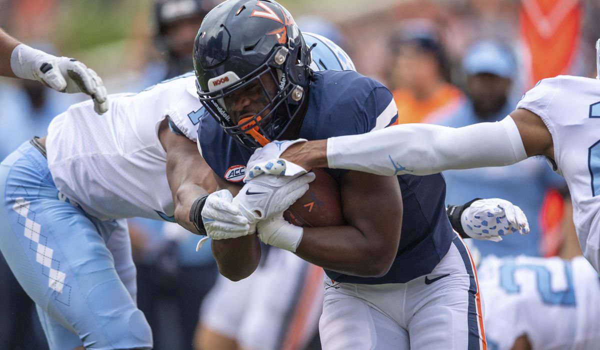 NextImg:Virginia player wounded in deadly attack returns for a new season as an inspiration to his teammates