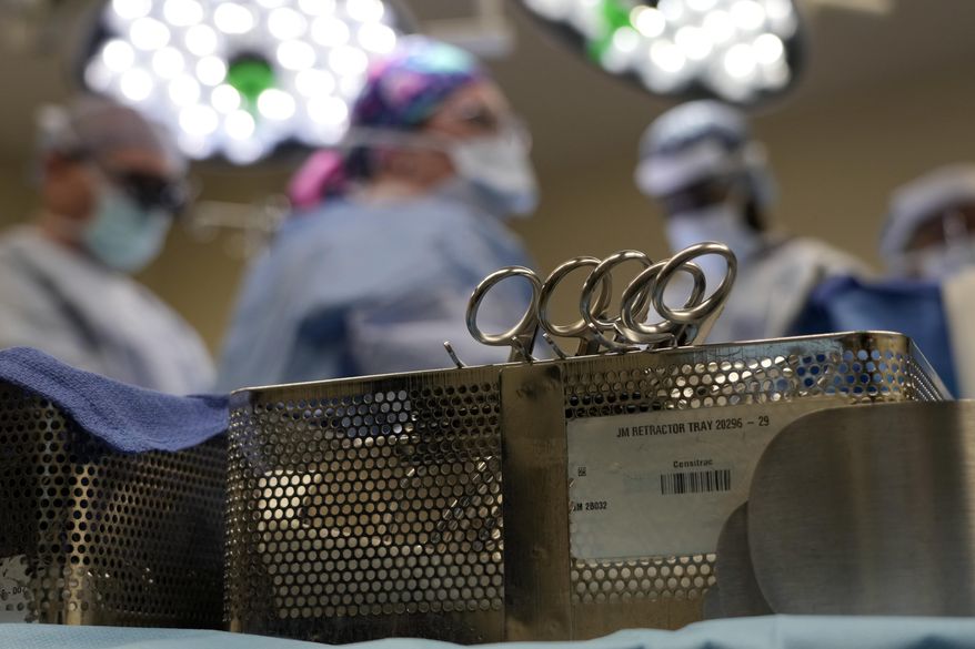 Instruments sit on a table in an operating room June 15, 2023, in Jackson, Tenn. Patients who take blockbuster drugs like Wegovy for weight loss may face life-threatening complications if they need surgery or other procedures that require empty stomachs for anesthesia. In June 2023, the American Society of Anesthesiologists issued guidance advising patients to skip daily weight-loss medications on the day of surgery and hold off on weekly injections for a week before any sedation procedures. (AP Photo/Mark Humphrey, File)