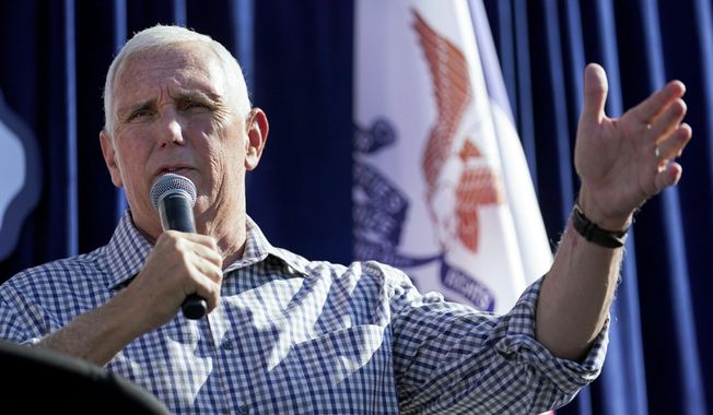 Republican presidential candidate former Vice President Mike Pence speaks during a Fair-Side Chat with Iowa Gov. Kim Reynolds at the Iowa State Fair, Aug. 11, 2023, in Des Moines, Iowa. He says he won&#x27;t sign the pledge required to participate, but former President Donald Trump&#x27;s Republican rivals are actively preparing as if he will be on stage for the GOP&#x27;s first presidential debate next week. (AP Photo/Jeff Roberson)