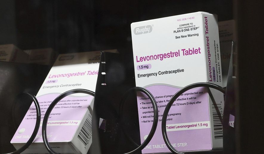 The emergency contraceptive levonorgestrel is displayed for sale in a vending machine on the campus of the University of Washington in Seattle on Friday, June 2, 2023. Taking piroxicam, which is typically prescribed for arthritis, together with the morning-after pill levonorgestrel could boost its effectiveness when taken up to three days after unprotected sex, according to new research published Wednesday, Aug. 16, 2023. (Kevin Clark/The Seattle Times via AP, File)