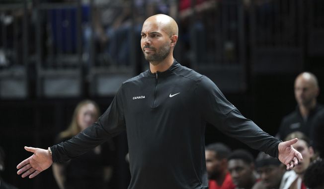 Canada&#x27;s head coach Jordi Fernandez gestures during a firendly basketball match between Germany and Canada in Berlin, Germany, Wednesday, Aug. 9 2023. (Soeren Stache/dpa via AP)