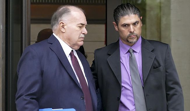 Gino DiGiovanni Jr., 42, and his attorney, Martin Minnella, walk outside the federal courthouse in New Haven, Conn. Aug. 15, 2023. DiGiovanni faces four misdemeanor charges from the U.S. Attorney&#x27;s Office in the District of Columbia in connection with his actions during the U.S. Capitol riot on Jan. 6, 2021. (Peter Yankowski/Hearst Connecticut Media via AP)