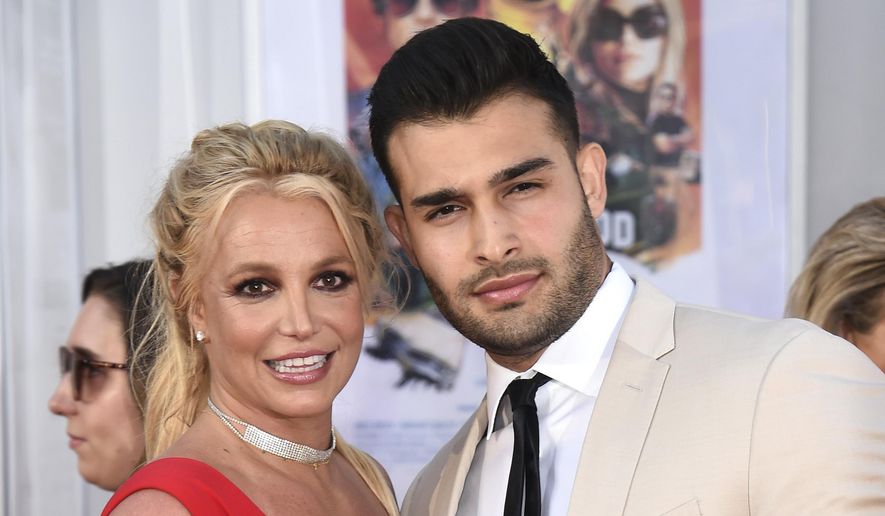 Britney Spears and Sam Asghari appear at the Los Angeles premiere of &quot;Once Upon a Time in Hollywood&quot; on July 22, 2019. Asghari has filed for divorce from Spears, a person familiar with the filing said late Wednesday, Aug. 16, 2023. The person, who is close to Asghari but not authorized to speak publicly, confirmed the filing happened Wednesday, hours after several outlets including TMZ and People magazine reported the couple had separated. (Photo by Jordan Strauss/Invision/AP, File)