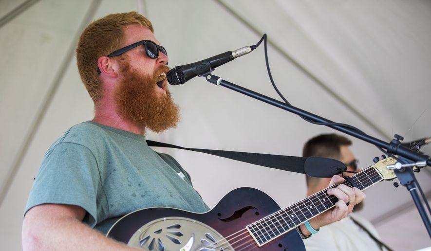 Oliver Anthony performs at Eagle Creek Golf Club and Grill in Moyock, N.C., on Saturday, Aug. 19, 2023. (Kendall Warner/The Virginian-Pilot via AP)