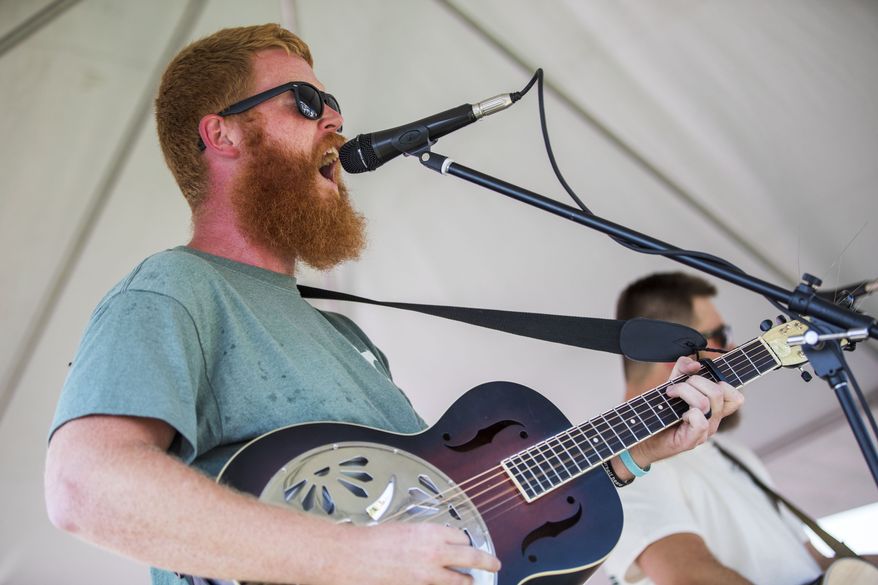 Oliver Anthony performs at Eagle Creek Golf Club and Grill in Moyock, N.C., on Saturday, Aug. 19, 2023. (Kendall Warner/The Virginian-Pilot via AP)