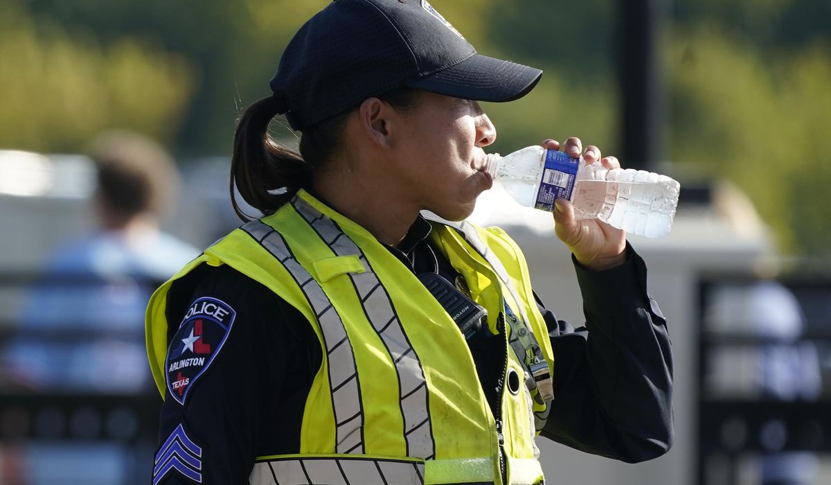 NextImg:Sweltering temperatures bring misery to large portion of central U.S., setting some heat records
