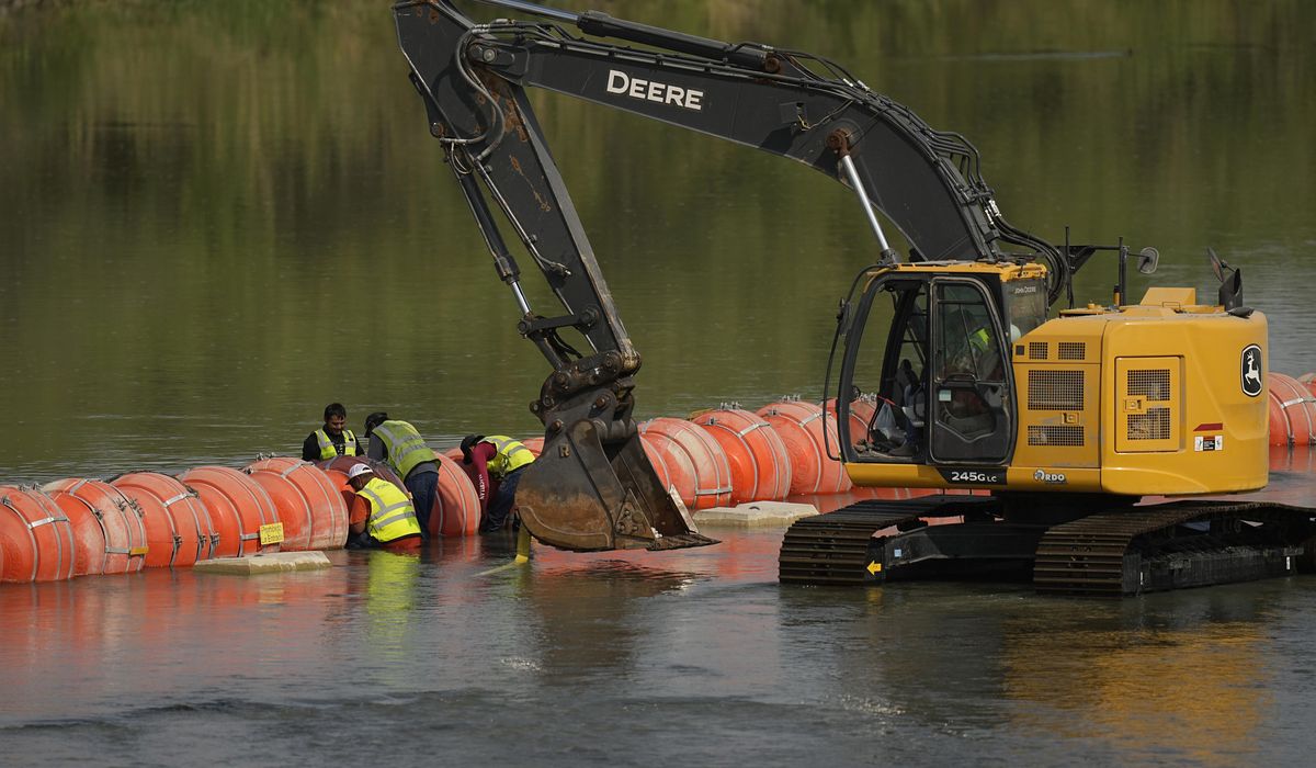 NextImg:Judge orders Texas to move floating barrier off Rio Grande to riverbank