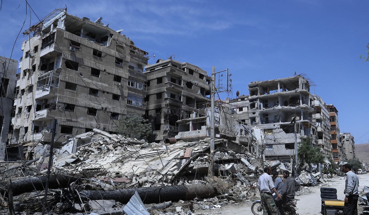 NextImg:A decade after a sarin gas attack in a Damascus suburb, Syrian survivors lose hope for justice