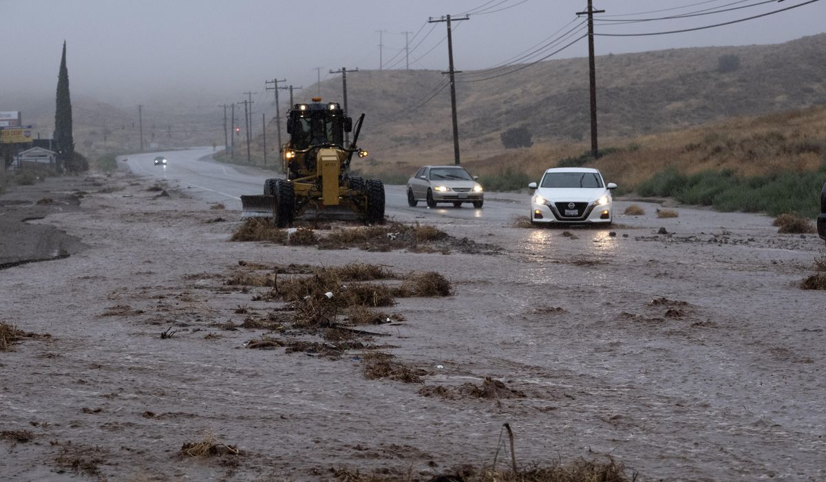 NextImg:Rain from Tropical Storm Hilary lashes California and Mexico, swamping roads and trapping cars