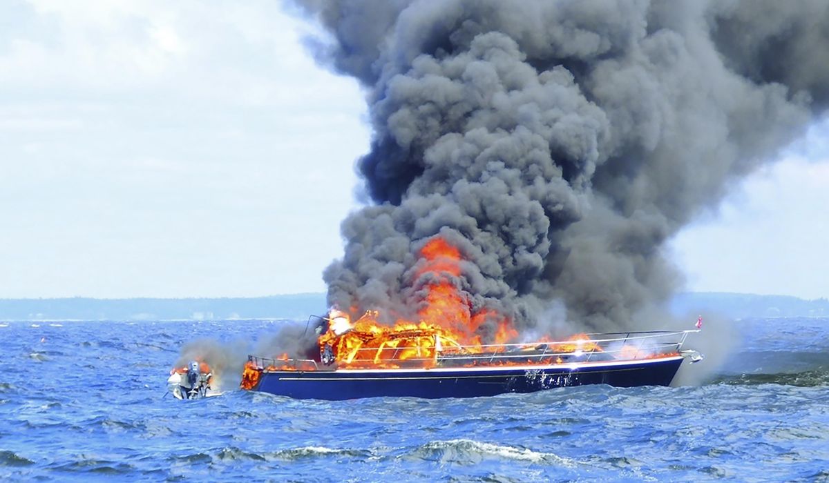 NextImg:Two boaters jump overboard when 48-foot yacht goes up in flames off Maine coast