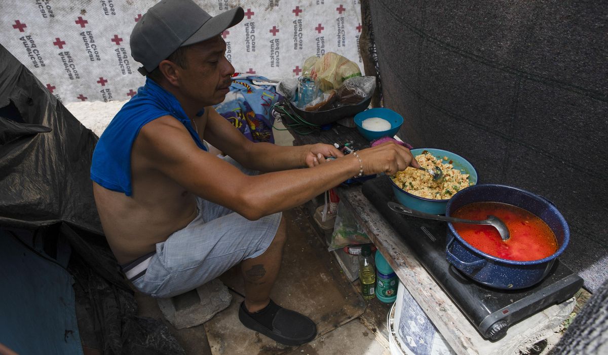 NextImg:Mexican border city struggles to find space for migrants even with a new shelter