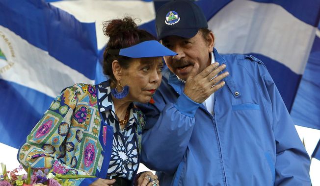 Nicaragua&#x27;s President Daniel Ortega and his wife, Vice President Rosario Murillo, lead a rally in Managua, Nicaragua. Nicaragua鈥檚 government on Wednesday, Aug. 23, 2023, declared the Jesuit religious order illegal and ordered the confiscation of all its property. (AP Photo/Alfredo Zuniga, File)