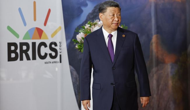 China&#x27;s President Xi Jinping arrives at the 2023 BRICS Summit in Johannesburg, South Africa, Wednesday, Aug. 23, 2023. (Gianluigi Guercia/Pool via AP) **FILE**