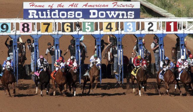 FILE - Horses compete in the 52nd All-American Futurity at Ruidoso Downs Racetrack and Casino, Sept. 6. 2010, in Ruidoso, New Mexico. In a letter sent Thursday, Aug. 24, 2023, to the New Mexico Racing Commission, New Mexico Gov. Michelle Lujan Grisham is demanding that the state horse racing regulators make immediate changes to address the use of performance enhancing drugs at the state鈥檚 tracks and that they consult with Kentucky, California and New York on best practices to ensure drug-free racing. (Rudy Gutierrez/The El Paso Times via AP, File)