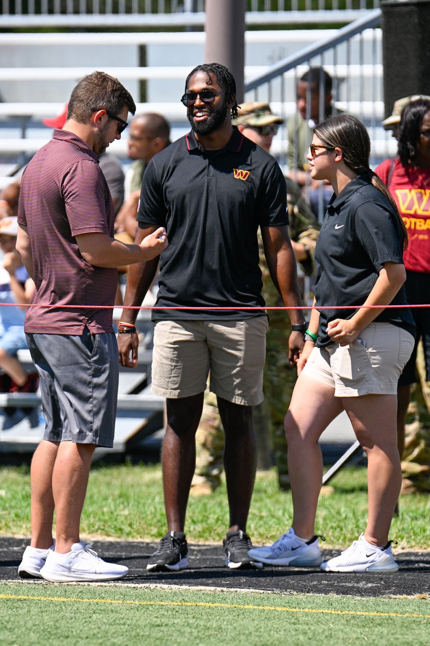 Suitland, MD - The Washington Commanders hosted a walk-through practice at Joint Base Andrews. After the practice, the players interacted with the on-site military personnel, their families, and friends. (Joe Glorioso | All-Pro Reels)