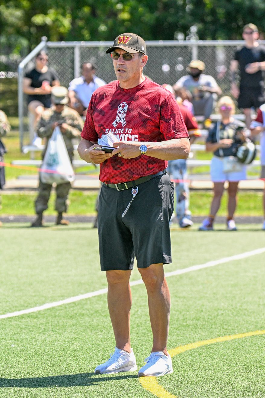 Suitland, MD - The Washington Commanders hosted a walk-through practice at Joint Base Andrews. After the practice, the players interacted with the on-site military personnel, their families, and friends. (Joe Glorioso | All-Pro Reels)