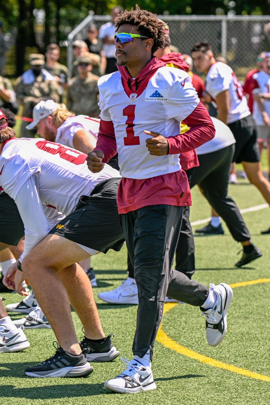 Suitland, MD - The Washington Commanders hosted a walk-through practice at Joint Base Andrews. After the practice, the players interacted with the on-site military personnel, their families, and friends. (Joe Glorioso | All-Pro Reels)