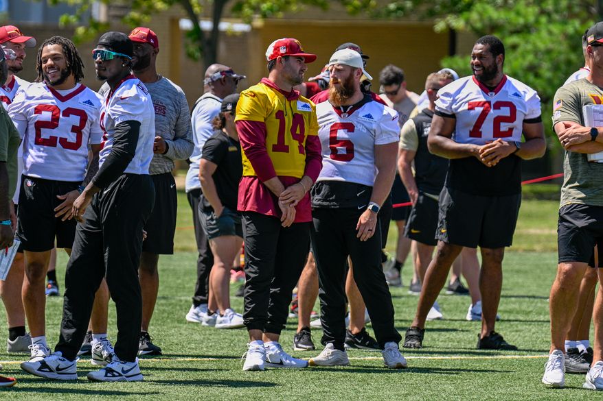 Suitland, MD - The Washington Commanders hosted a walk-through practice at Joint Base Andrews. After the practice, the players interacted with the on-site military personnel, their families, and friends. (Joe Glorioso | All-Pro Reels)